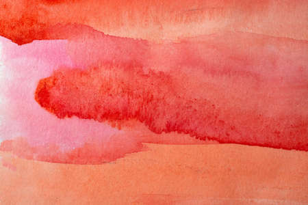 red watercolors on paper texture, background design, hand painted elementの写真素材