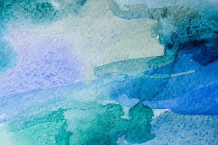 blue and green watercolors on paper texture, background design, hand painted elementの写真素材