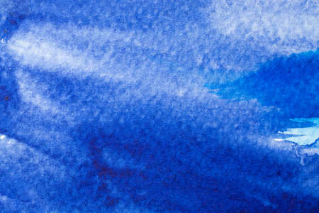 blue watercolors on paper texture, background design, hand painted elementの写真素材