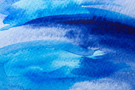 blue watercolors on paper texture, background design, hand painted elementの写真素材