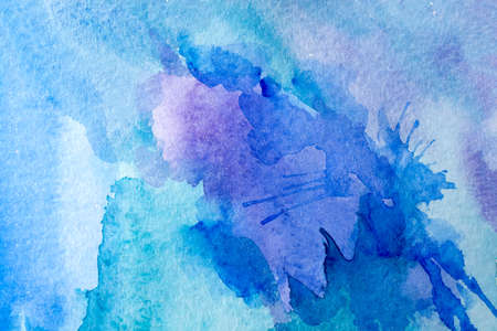 Abstract Hand painted blue purple watercolor background on wet paper, texture for creative wallpaper or design artwork.の写真素材