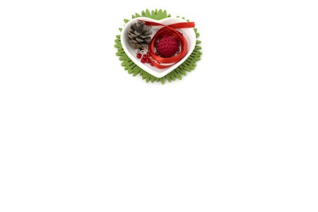 Picture with red ribbon, heart shape small bowl and decorationsの写真素材