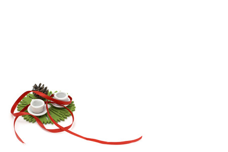Picture with red ribbon, two miniature cup and decorationsの写真素材