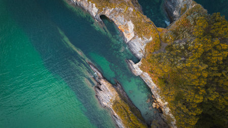 Aerial view of the coast with turquoise water and sharp cliffs in Galiciaの写真素材