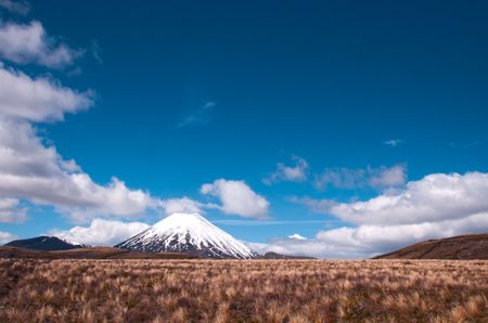 Mt Ngaurohoe in Tongariro National Park, New Zealand. Iconic snow-capped mountain was used in the Lord of the Rings movies and is better known as Mount Doom.の写真素材
