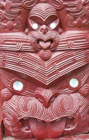 Maori wood carving outside the Maori meeting house at the Treaty Grounds の写真素材