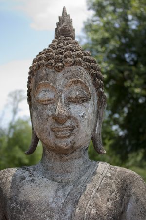 Close- Up of beautiful statue carved in rock at Sukhothai, Thailandの写真素材