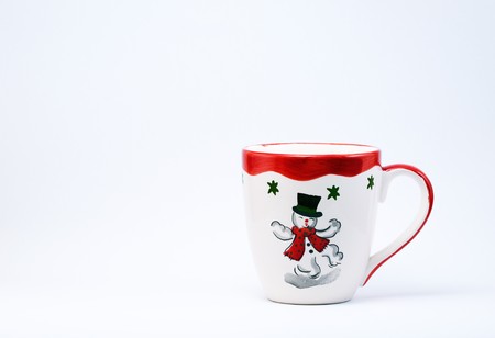 Christmas Mug with a Snowman on a white background.の写真素材