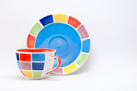 Colourful Checkered Cup on a White Background.の写真素材