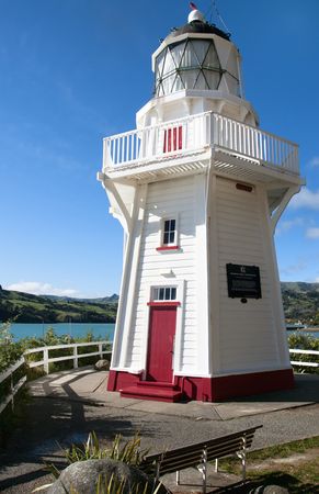 Beautiful wooden Akaroa Lighthouse in Akaroa Bay, New Zeland の写真素材