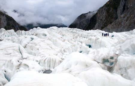 Hikers on Franz Josef Glacier in New Zealand, October 10 2009. The glacier area attracts around 250,000 visitors a year and up to 2,700 per day.のeditorial素材