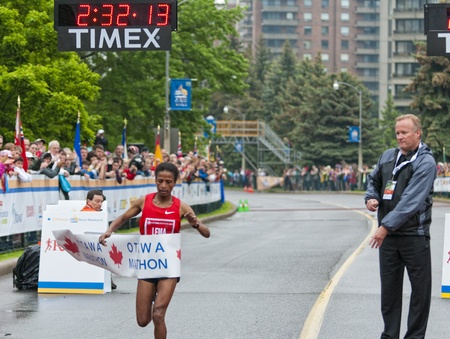 The 2011 Ottawa Marathon, May 29 2011, Ottawa, Canada. Kebebush Haile Lema was the winner of the women's 2011 Ottawa Marathon in 2:32:14.0のeditorial素材
