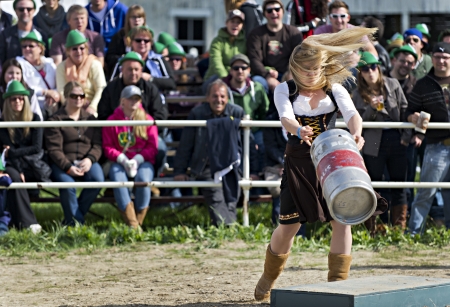 Lisa Batten competing in the Keg distance throwing competition at the Beau's forth annual Oktoberfest held at Vankleek Hill fairgrounds, Ottawa onSeptember 19 2012.のeditorial素材