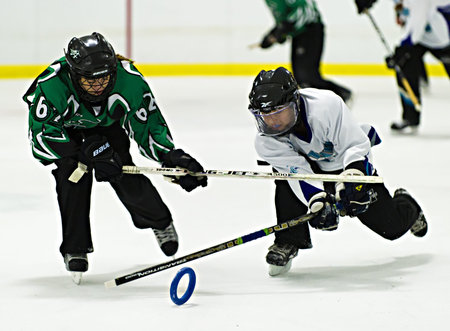 Ottawa's Nicole Mills (right)  during the Ottawa Belle under 19's 7-4 victory against Bonvital of...