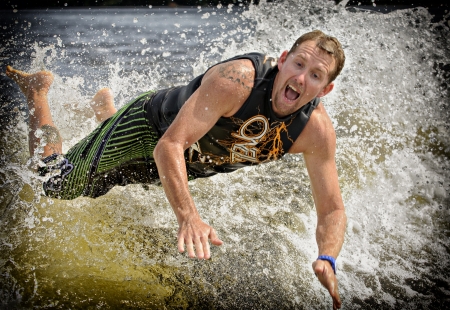 Drew Danielo competes in the 1st annual Calabogie Wake Surf Championship held on Calabogie Lake, Ontario, Canada on July 12 2013. Drew finished 2nd in both the Pro Mens Skim and Surf competitions.のeditorial素材