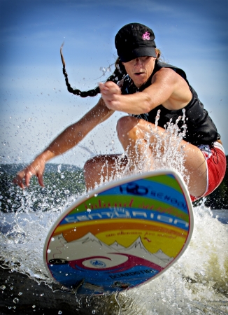Canadian Caroline Villeneuve competes in the 1st annual Calabogie Wake Surf Championship held on Calabogie Lake, Ontario, Canada on July 12 2013. Caroline finished 1st in the Pro Women's Skim competitions.のeditorial素材