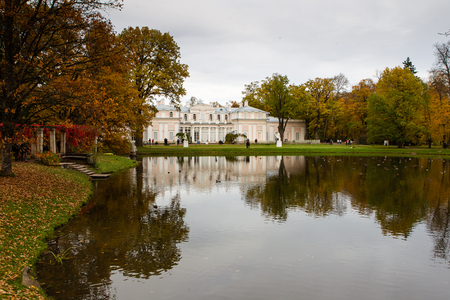 Landscape with secluded palace near lake in autumnの写真素材
