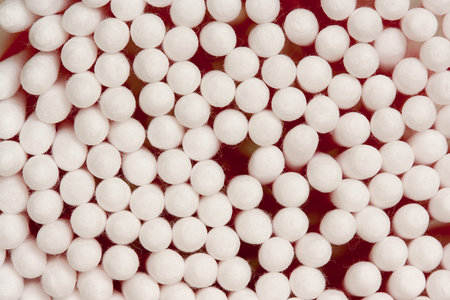 Abstract background with top view of cotton swab tips