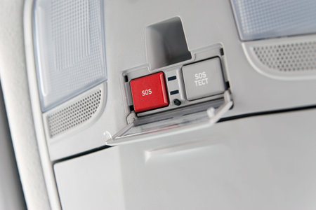 Close up image of emergency button in passenger car