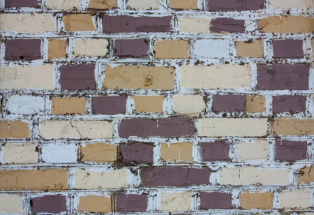 Brick wall made of colored bricks.の写真素材