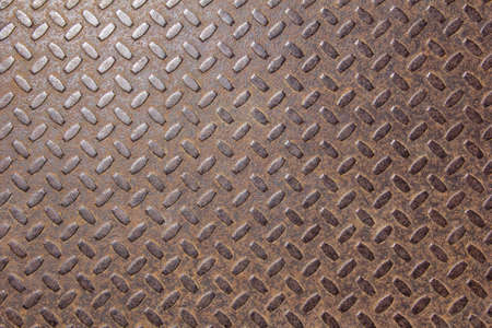 The texture of corrugated sheet metal painted in red.の写真素材