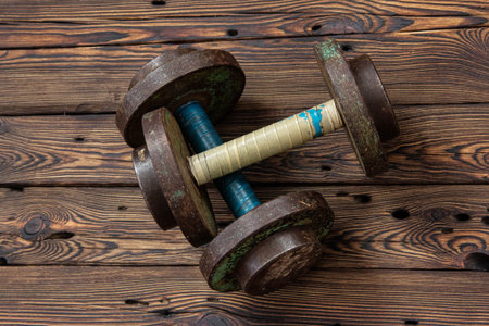 Old collapsible dumbbells on the floor