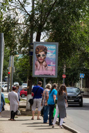 Orenburg Russia 07.23.2020 People at a public transport stop.のeditorial素材