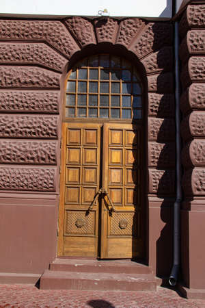 Vintage wooden door glazed on top.の写真素材
