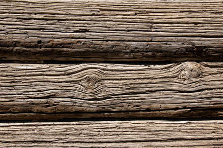 The texture of old brushed wood with a clear pattern of fibers.の写真素材