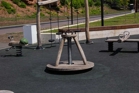 A new playground with different carousels and swings.の写真素材