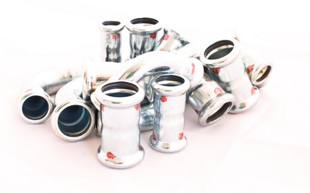 inox stainless steel instalation fittings for industry and house instalations on bright background