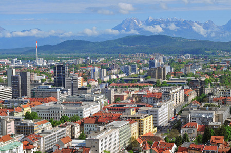 Aerial view of Slovenian capital Ljubljana with Alp mountains in the backgroundの写真素材