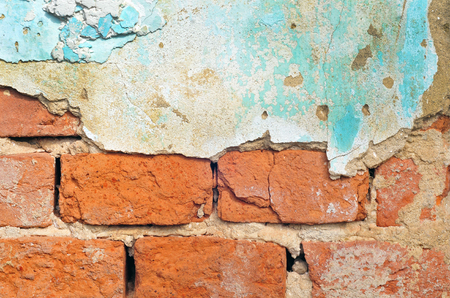 Photo of brick wall with part of plasterの写真素材