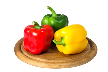 peppers on a cutting board. white backgroundの写真素材