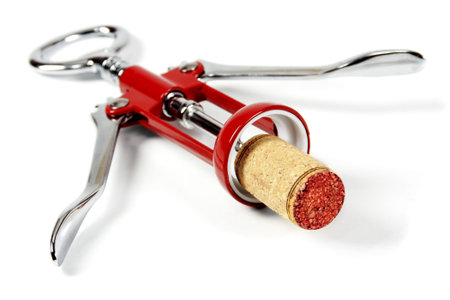 Corkscrew and Cork on white background