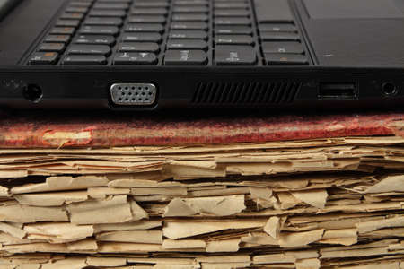 laptop on old book  close upの写真素材