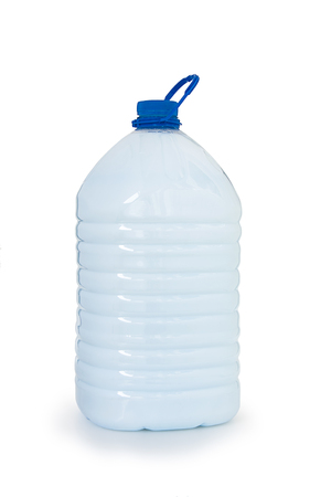 bottle with white liquid on white backgroundの写真素材
