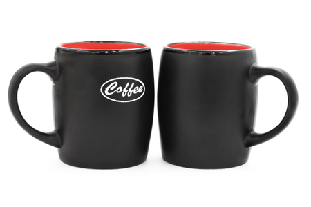 Two black mugs on a white backgroundの写真素材