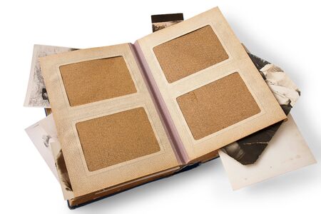 open old album with photo on white backgroundの写真素材
