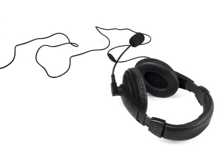 black headphones with cable on a white background