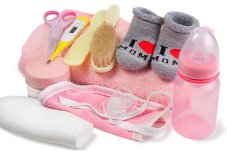 baby care accessories with socks on white backgroundの写真素材