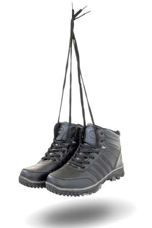 males winter shoes on white backgroundの写真素材