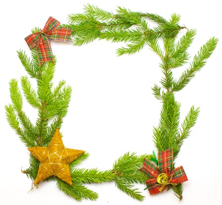 Green fresh spruce frame with decoration isolated on whiteの写真素材