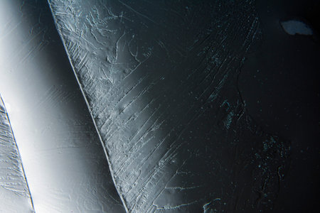 abstract background with frozen glass, macro photo of ice surface