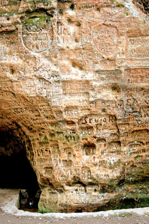 Signs on the wall at Gutmana cave in Turaida, Latviaの写真素材