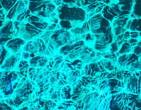 Blue fresh water in swimming poolの写真素材