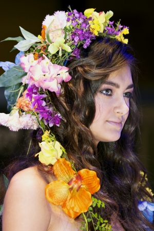  Beautiful brunette with a floral chaplet on a head. Riga Photo Show November 09, 2012のeditorial素材