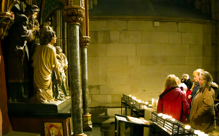 Believers near composition on a theme the crucifix of Christ in Cologne cathedral of St  Peter and Mary in Cologne, Germany 30 12 2012のeditorial素材