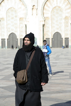 Believers at walls of Hassan II Mosque in Casablanca, Morocco  It is the largest mosque in the country and the 7th largest in the world のeditorial素材