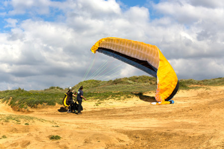 The glider pilot prepares for flight on a paraplane on a Arsuf coast about 15 kilometres north of...